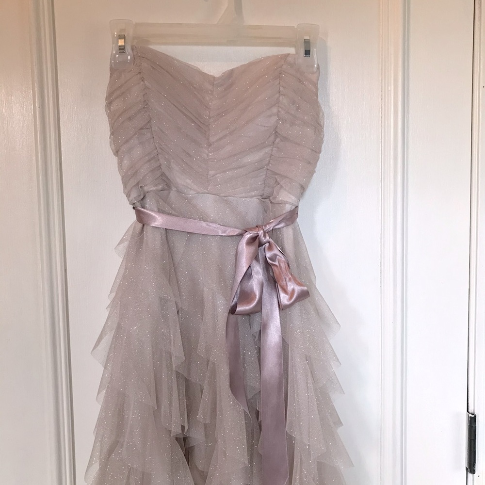 Formal short dress with rose belt.